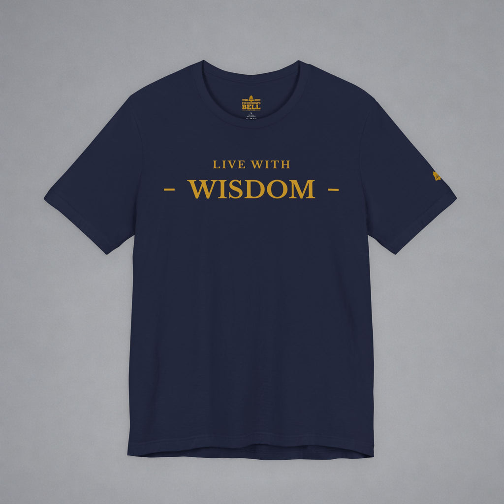A navy blue short-sleeve t-shirt with 'LIVE WITH WISDOM' printed in gold across the chest, displayed flat against a neutral gray background.