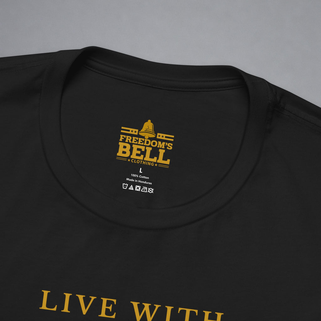 Close-up of a black crewneck t-shirt showing the inner neck label with a gold 'Freedom's Bell Clothing' logo and the bottom edge of a gold 'LIVE WITH' graphic print.
