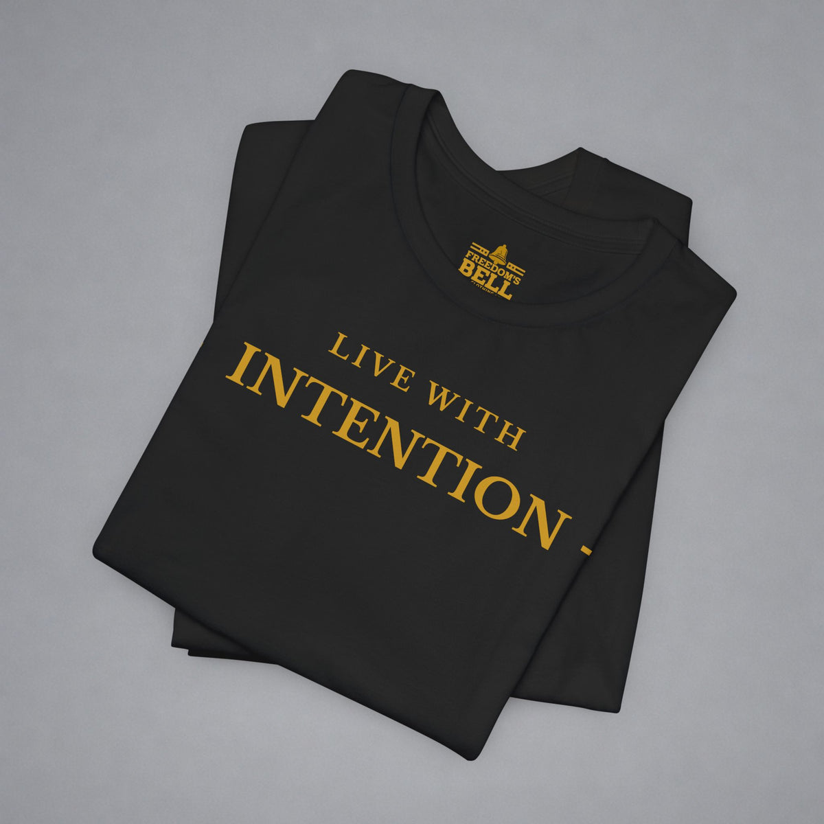 Black t-shirt with 'Live with Courage' text on a gray background