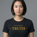 A woman with a short dark bob hairstyle wearing a black crewneck t-shirt with the text 'LIVE WITH - TRUTH -' printed in gold on the chest, set against a solid gray background.