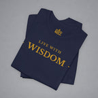 A folded navy blue t-shirt with gold text reading 'LIVE WITH WISDOM' and a small 'BELLS' logo printed inside the collar, displayed on a neutral gray background.