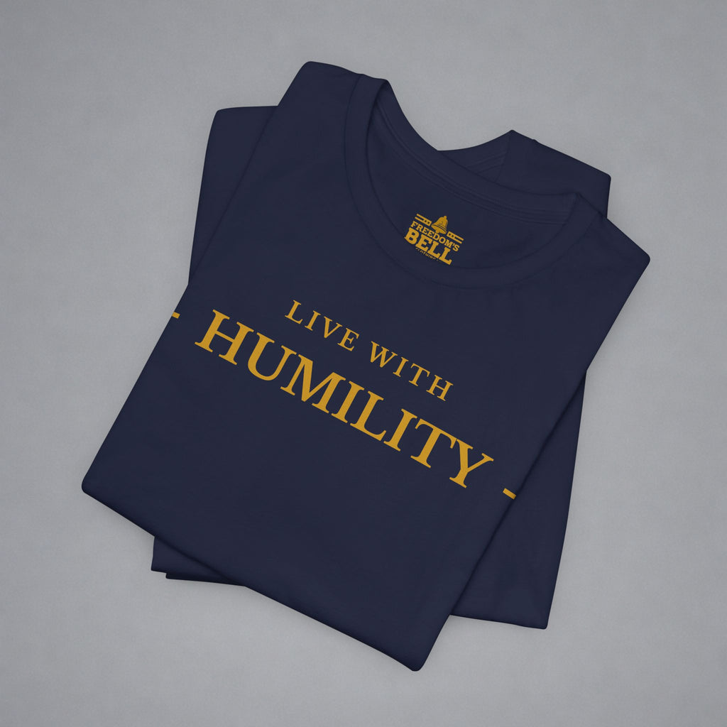 Folded navy blue t-shirt with 'Live with Morals' text on a gray background